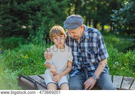 Great-grandfather And Great-grandson Spend Time Together In The Park