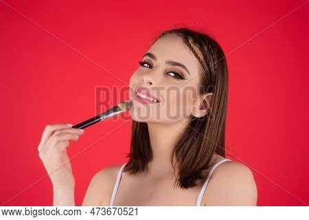 Girl Hold Blush Blusher Apply Powder Visage Isolated Over Studio Background. Young Woman Powdering C