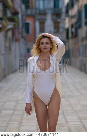 Beautiful Women In Bodysuit, Street Italian Fashion Concept. Women Sexy Body In Bodysuit Ner Venezia