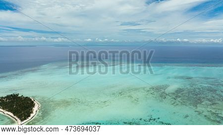 Island In The Blue Sea With A Coral Reef And The Beach Iew From Above. Onok Island, Balabac, Philipp