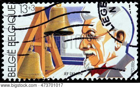 Luga, Russia - March 18, 2023: A Stamp Printed By Belgium Shows Famous Carillon Player From Mechelen