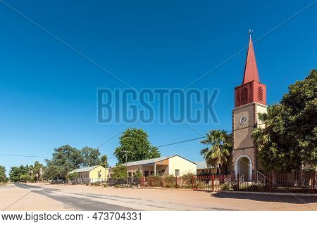 Keimoes, South Africa - Feb 25, 2023: A Street Scene, With The Historic Roman Catholic Mission Churc