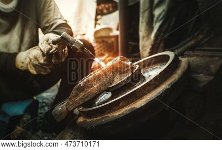Close Up Hand Heavy Industrial Worker Is Working On Metal Work Factory Process By Cutting Sheet Stee