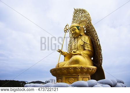 Ancient Golden Jijang Bosal Statue On Stone Rock Cliffs For Korean People Travelers Travel Visit And