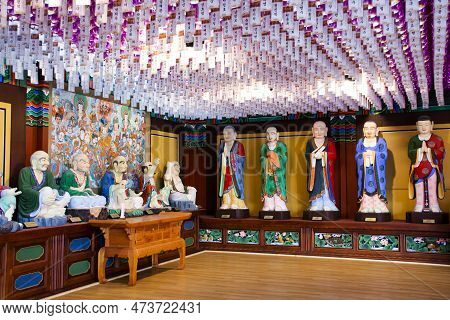 Colorful Deity Angel Statue In Yonggung Shrine For Korean People Travelers Visit Respect Praying Ble