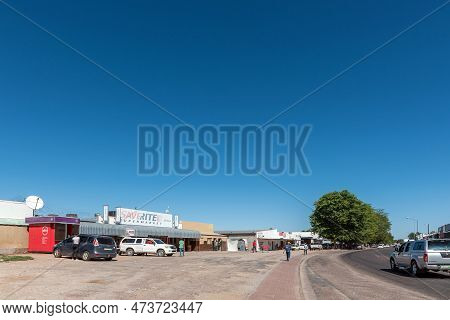 Keimoes, South Africa - Feb 25, 2023: A Street Scene, With Businesses, People And Vehicles, In Keimo