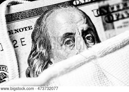 A Hundred-dollar Bill With A Medical Mask .the Concept Of Coronavrius Epidemic