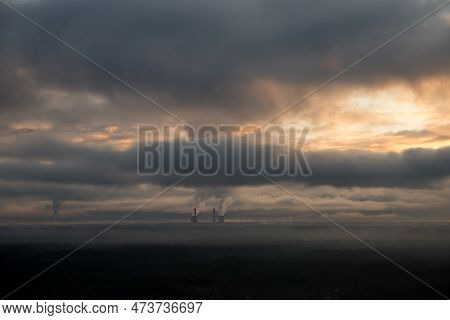 Smoking Pipes Of Thermal Power. Smoke From The Chimney Stretches.dramatic Sunset Sky. Environment, E