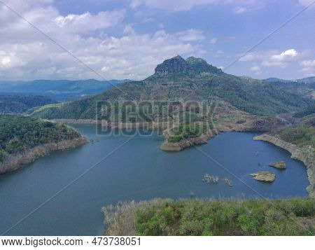 Aerial View Of Lake Against The Hills