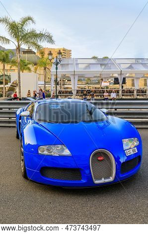 Monte Carlo, Monaco - May 27, 2022: Blue Bugatti Veyron 16.4 Luxury Supercar In Front Of The Famous 