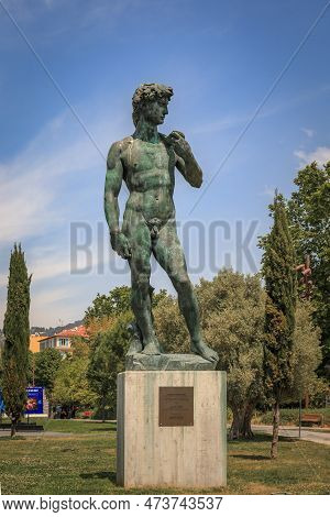 Nice, France - May 24, 2022: Michelangelo Sculpture Of David In Bronze On The Coulee Verte Or Promen