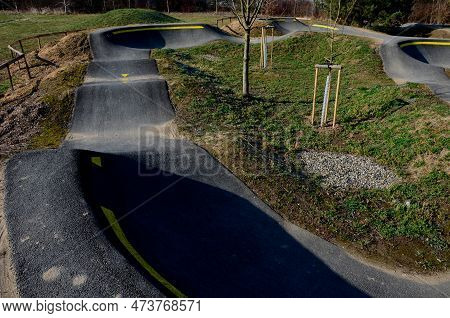 Bike Path In The Car Park Pumping (moving Up And Down) Is Used Instead Of Pedaling And Bouncing To M