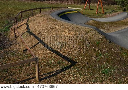 Bike Path In The Car Park Pumping (moving Up And Down) Is Used Instead Of Pedaling And Bouncing To M