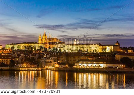 Night View Over The River Moldau And The Castle During Blue Hour In Prague, Czech Republic