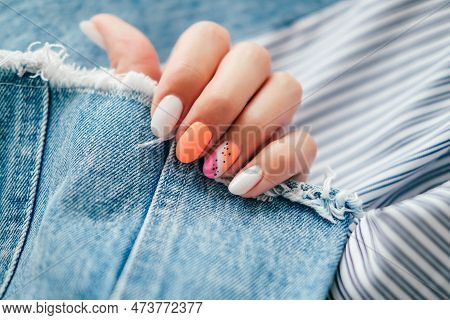 Beautiful Female Hands With Manicure On A Denim Background. Stylish Nail Design. Summer Manicure Wit