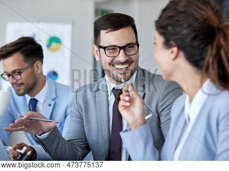 A Portrait Of A Young Businesspeople Talking Smiling During A Meeting And Presentation In The Office