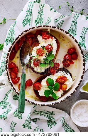 Bruschetta With Buratta And Baked Cherry Tomatoes.top View.selective Focus