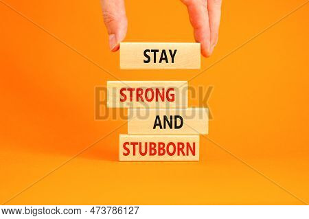 Stay Strong And Stubborn Symbol. Concept Words Stay Strong And Stubborn On Wooden Block. Beautiful O