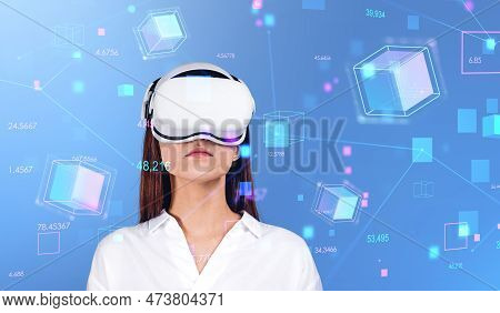 Portrait Of Young Woman Wearing Vr Goggles Over Blue Background With Double Exposure Of Immersive Ne