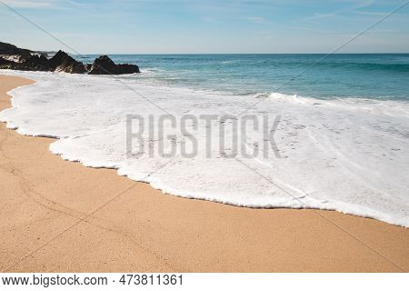 Walk Along The Atlantic Ocean On The Beach Called Praia Da Ilha Do Pessegueiro Near Porto Covo, West