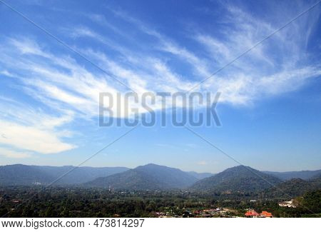 Many Mountains Are Densely Covered With Trees, The Sky Is Beautiful
