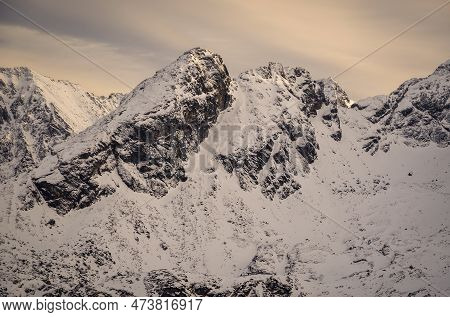 Winter Mountain Landscape In Polish Tatra Mountains. Snowy Morning With A View Of The Koscielec Moun