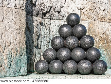 Copenhagen, Denmark - September 13, 2010: Pile Of Black Cannon Balls Closeup At Admiral Ivar Huitfel