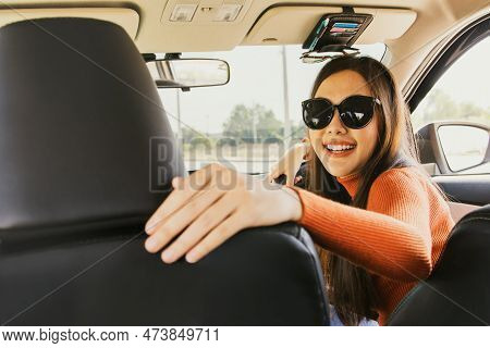 Concept Teach Driving : Happy Beautiful Young Asian Newbie Girl In Sunglasses Preparing For Driving 