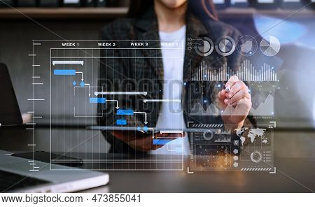 Businesswoman Hand Project Manager Working And 
Pdate Tasks And Gantt Chart Scheduling Virtual Diagr