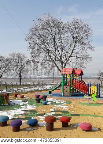 Trencianske Stankovce, Slovakia, March 18, 2023: Children's Playground Near The Village School. Spri