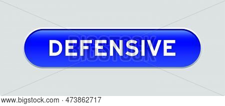 Blue Color Capsule Shape Button With Word Defensive On Gray Background