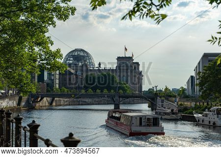 Berlin, Germany 06.05.2022: Reichstag In Berlin And Marschall Bridge Which Spans River Spree