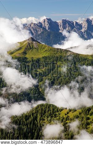 Dolomites Mountains In The Middle Of Clouds, Carnian Alps Mountains, Italy