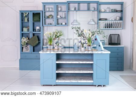 Wooden Kitchen In Easter Decor. Cozy Home Decor. Kitchen Utensils, Dishes And Plate On Table. Kitche