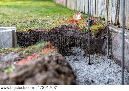 The Foundation Of The House Is Made Of Concrete Blocks Bound With Metal Armature