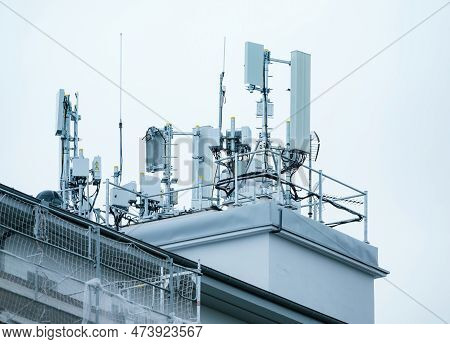 A 4g Lte Antenna Atop A Built Structure, Connecting People And Industry Through Cellular Radio Techn