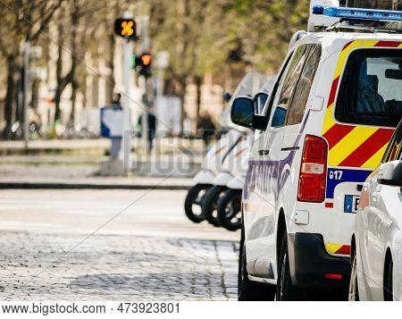 Strasborg, France - Mar 29, 2023: A French Police Car Patrols The Streets Of An Urban City, Providin