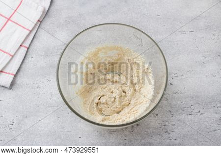 Glass Bowl With Dough On A Gray Background. Cooking Greek Easter Orange Sesame Koulourakia Cookies S