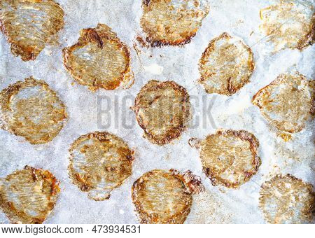 Close-up Macro Shot Of Cooking Paper With Greasy Prints Left By Fried Meatballs, Creating Appetizing