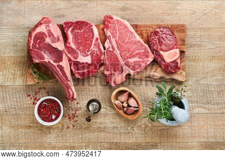 Raw Prime Steaks. Variety Of Fresh Black Angus Prime Meat Steaks T-bone, New York, Ribeye, Striploin