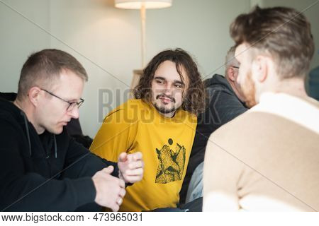 Vilnius, Lithuania - March 26 2023: Group Of Boys Enjoying Time Together During A Yoga Class Or Grou