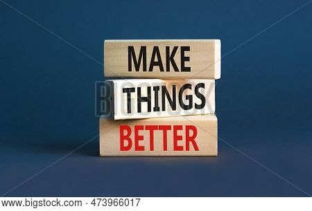 Make Things Better Symbol. Concept Words Make Things Better On Wooden Block On A Beautiful Grey Tabl
