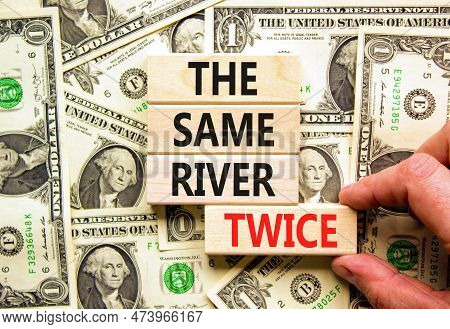 The Same River Twice Symbol. Concept Words The Same River Twice On Wooden Block. Beautiful Backgroun