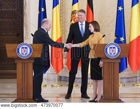 Bucharest, Romania. 3rd Apr, 2023: Olaf Scholz (l), Chancellor Of Germany, Shakes Hands With Maia Sa