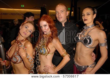 Paula Labaredas, Phoebe Price, Jamin Fite and Annisse  at the annual Slave Leia Group Photo at ComicCon, San Diego Convention Center, San Diego, CA. 07-23-10