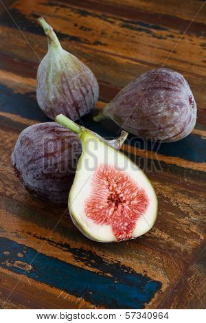 Fresh Figs On A Wooden Table