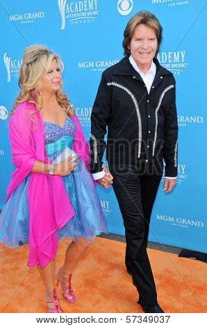 John Fogerty and Wife Julie at the 45th Academy of Country Music Awards Arrivals, MGM Grand Garden Arena, Las Vegas, NV. 04-18-10