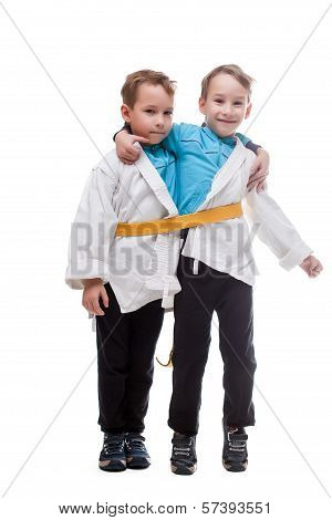 Funny twin brothers pretending siamese, in studio