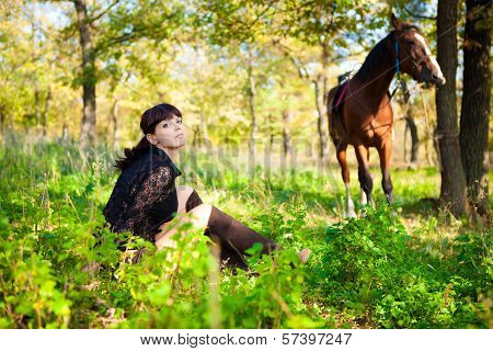girl and horse in the woods