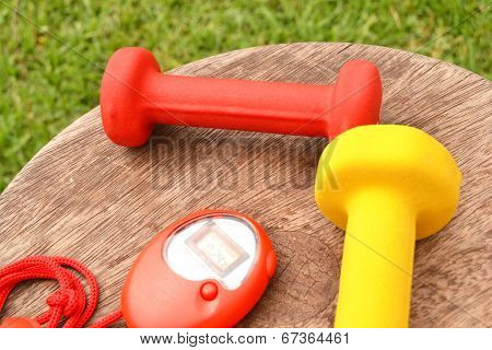 Timer and dumbbells